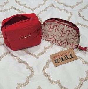 Bundle of 2 Clarins CosmeticBags: One Red Cotton-like, One Red & Cream Canvas